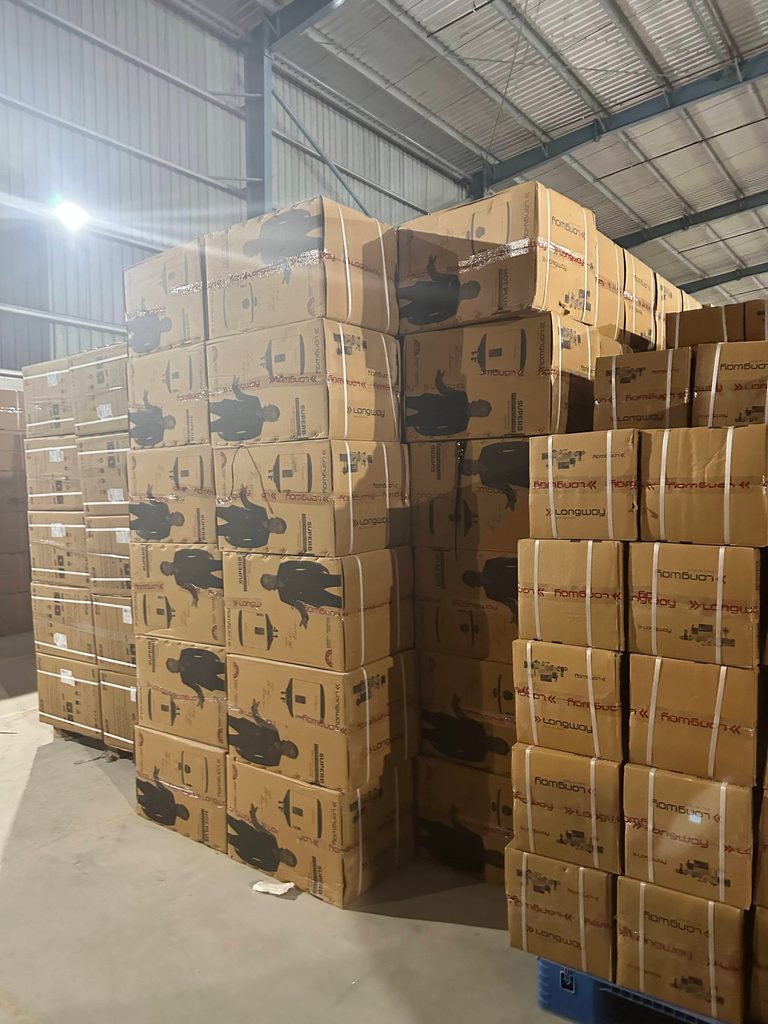 RFID testing setup on electronics warehouse rack with appliance cartons